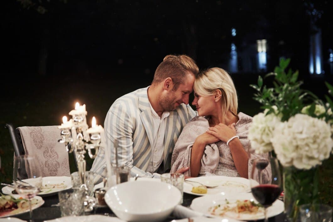 a man and a woman sitting at a table